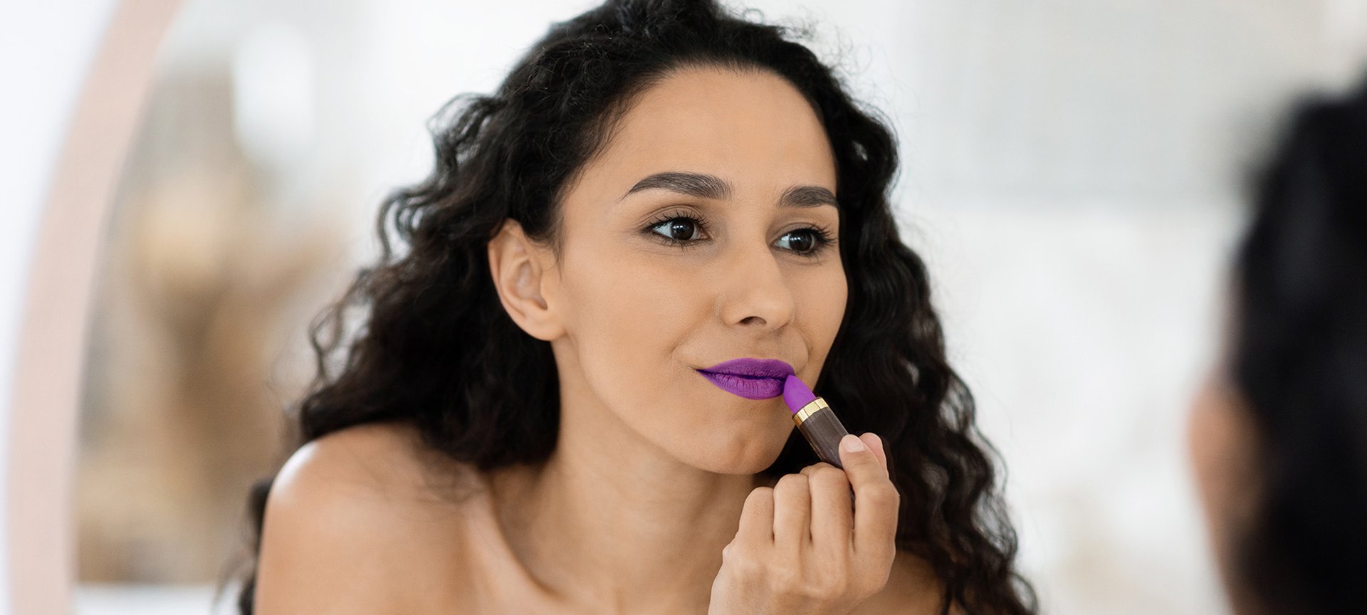 Dark purple lipstick top