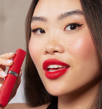 Person Holding Infallible Matte Resistance Red Lipstick