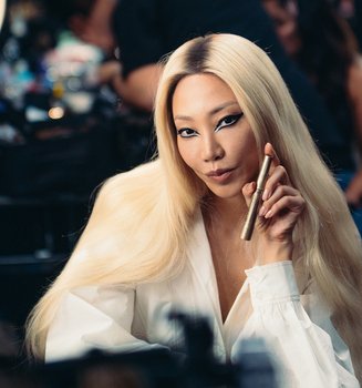 A Model Posing At Paris Fashion Week