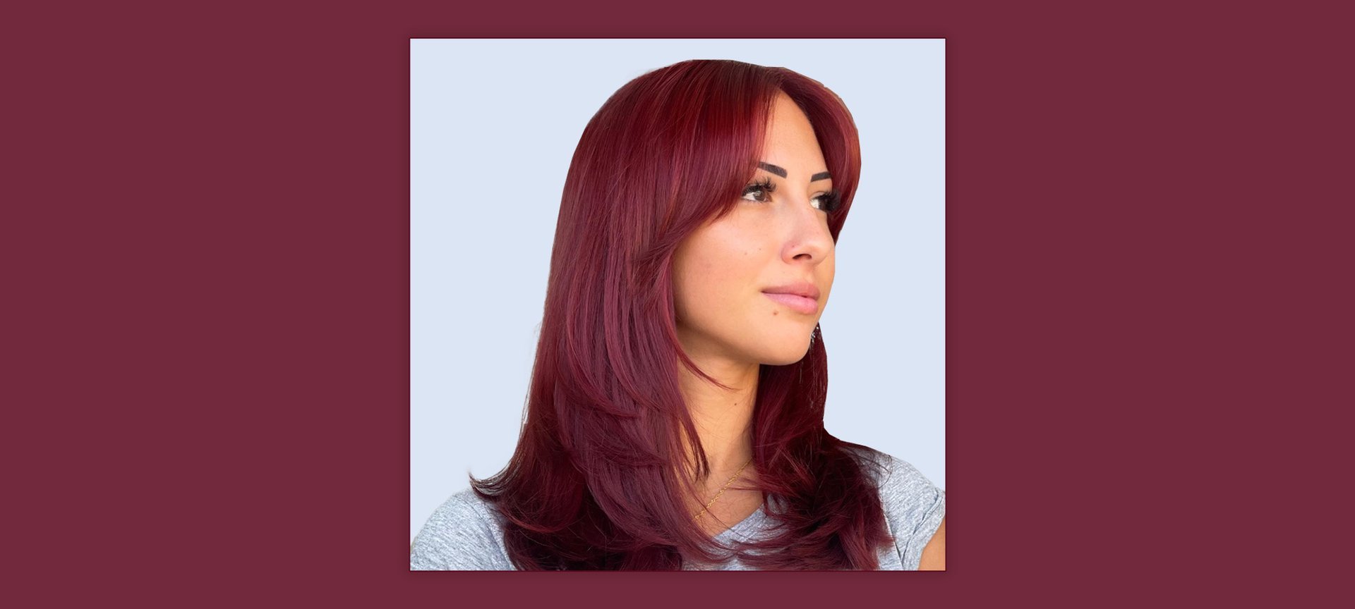 https://www.lorealparisusa.com/-/media/project/loreal/brand-sites/oap/americas/us/beauty-magazine/2023/11-november/11-13/how-to-bright-cherry-red-hair-color/person-with-cherry-red-hair-color.jpg