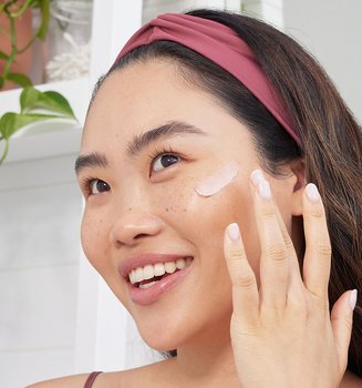A Person Applying A Skincare Routine For Your 20s