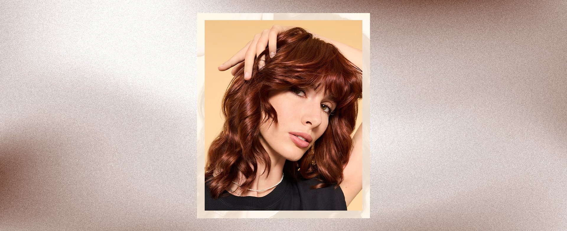 Layered wavy hair showing off a stylish and voluminous haircut, ideal for enhancing natural waves with added texture. - desktop