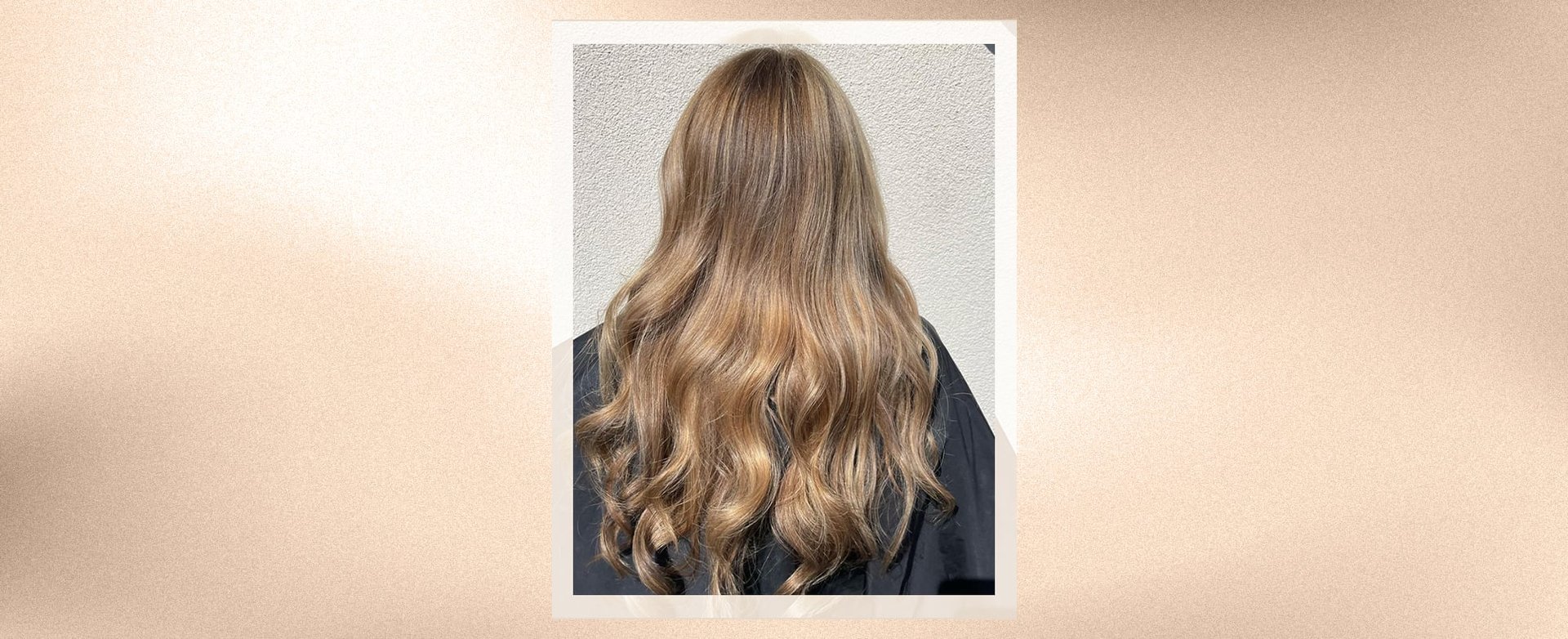 A woman with reverse balayage hair color