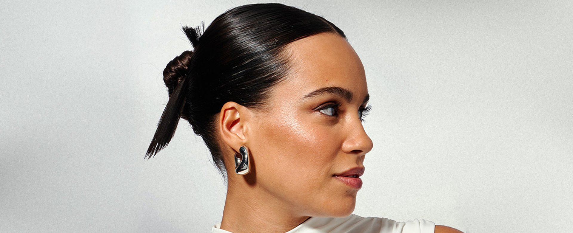 A woman with a bun hairdo