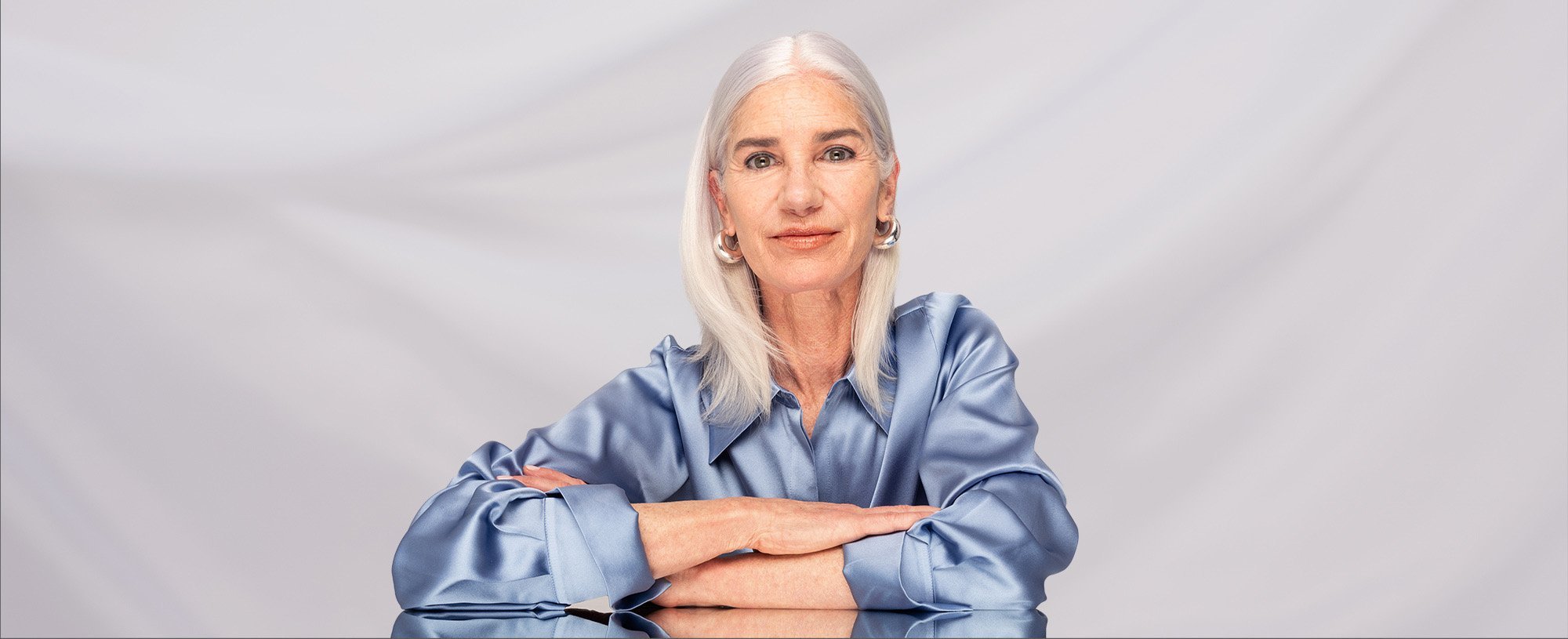 Older woman with long grey hair