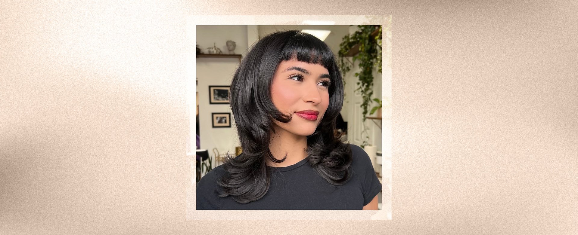 A woman wearing micro bangs hairstyle