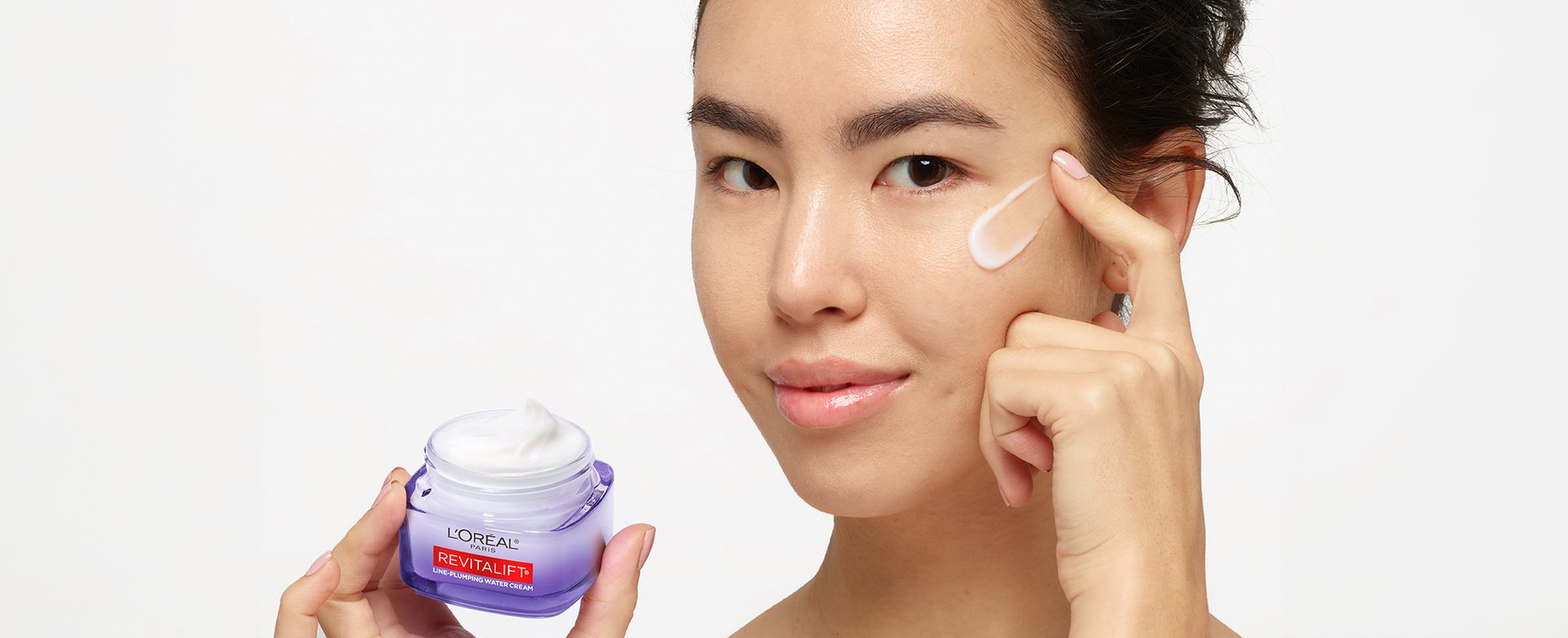 A lady applying Bright Reveal