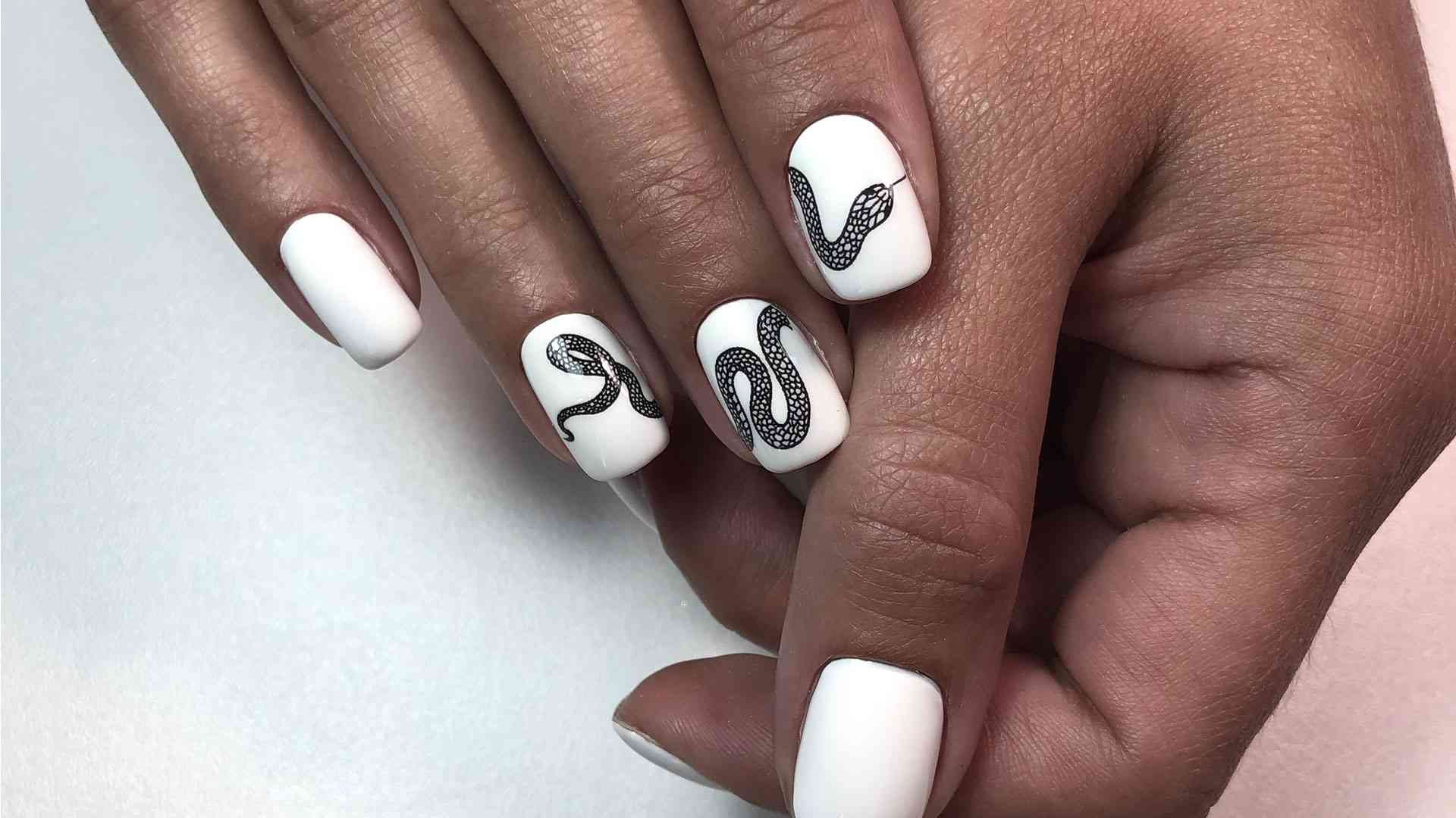 7. Black and White Snake Nails - wide 5